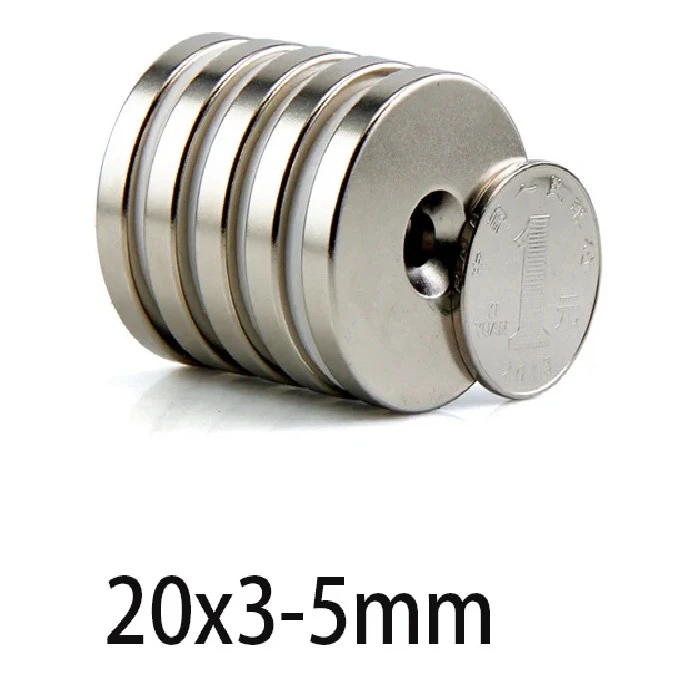 Okrogli magneti z luknjo 20 x 3mm luknja 5mm, okrogli magneti, močni magneti, neodymski magneti, NdFeB magneti, magnetna moč, velikost, oblika, aplikacije, prednosti, izbira, varnost